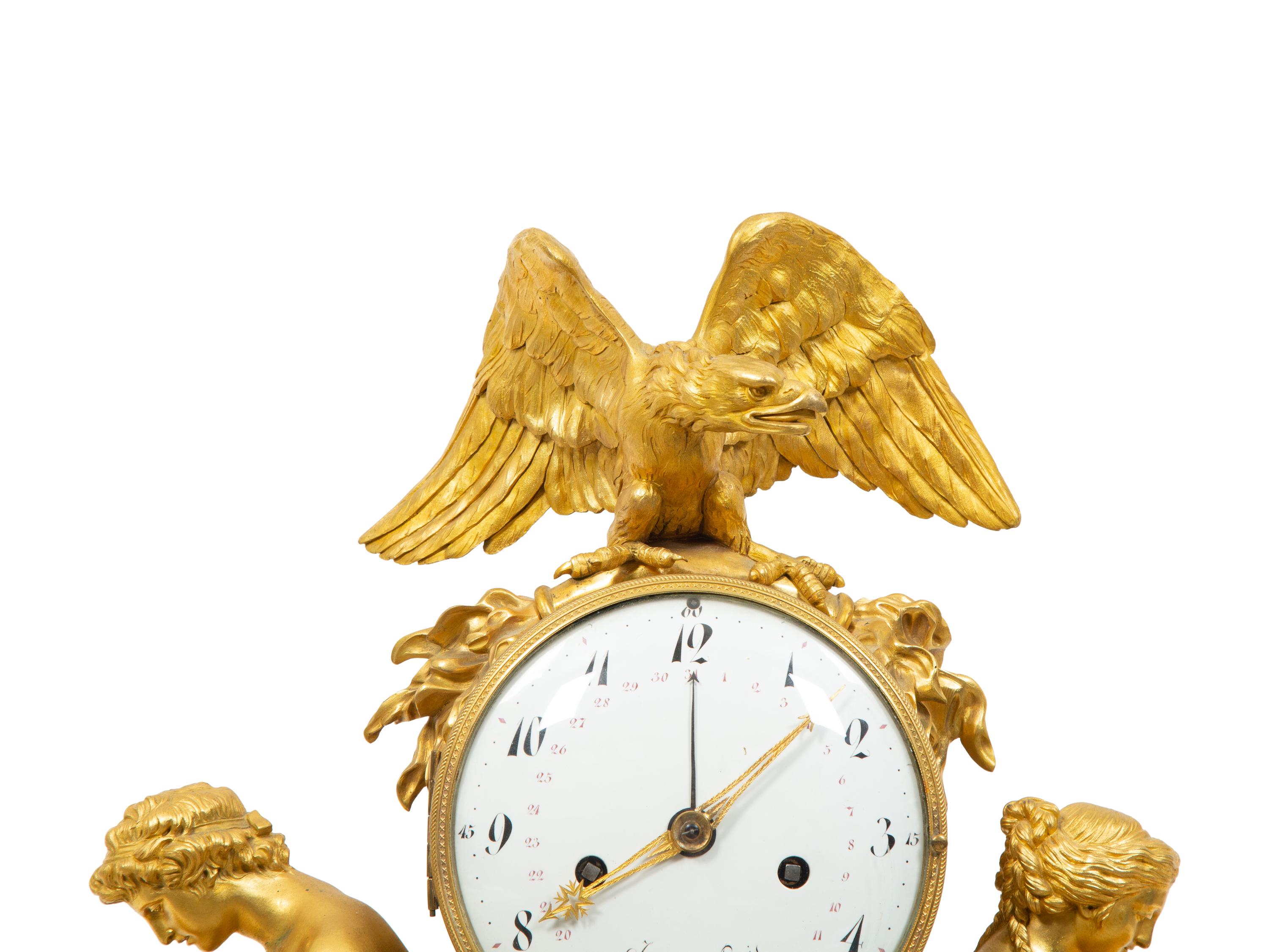 A Late Louis XVI Gilt Bronze and Marble Mantel Clock