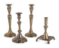 Sixteen English Brass Candlesticks