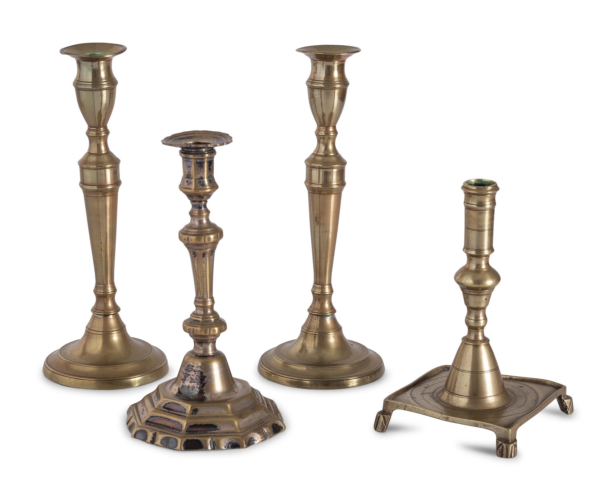 Sixteen English Brass Candlesticks
