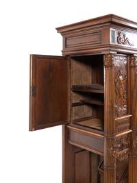 A French Renaissance Revival Carved Walnut and Marble-Inset Court Cupboard