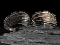 Pair of Navajo or Zuni Silver and Turquoise Cluster Cuff Bracelets