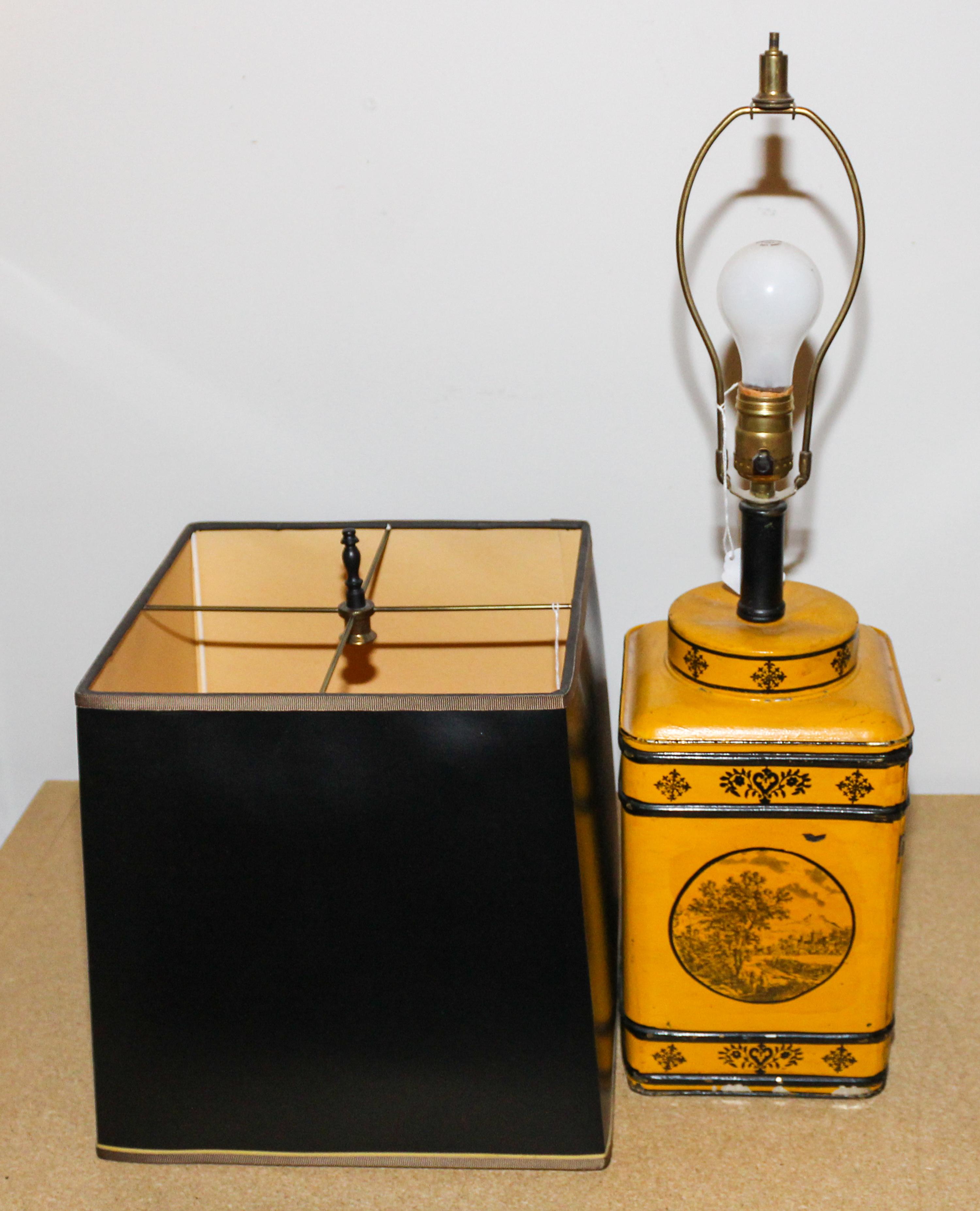 A Regency Tole Decorated Tea Canister Height of canister 11 5/8 inches.