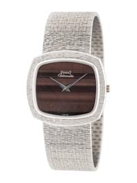 PIAGET, 18K WHITE GOLD AND TIGER'S EYE WATCH