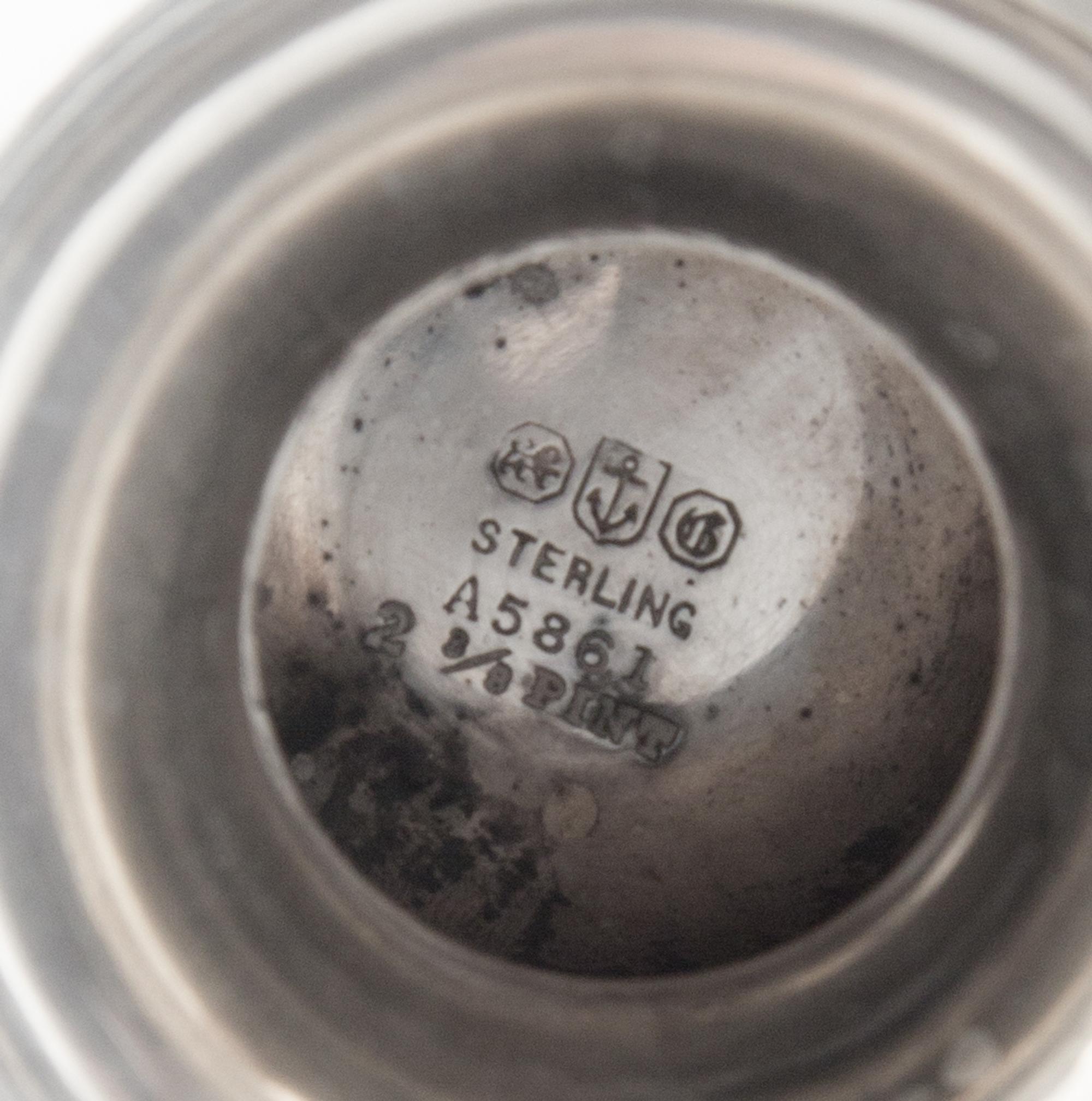 An American Silver Tyg, Gorham Mfg. Co., Providence, RI, the rim with a continuous foliate band, the body with an engraved monogram.