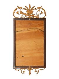 An Italian Neoclassical Style Giltwood and Mahogany Mirror