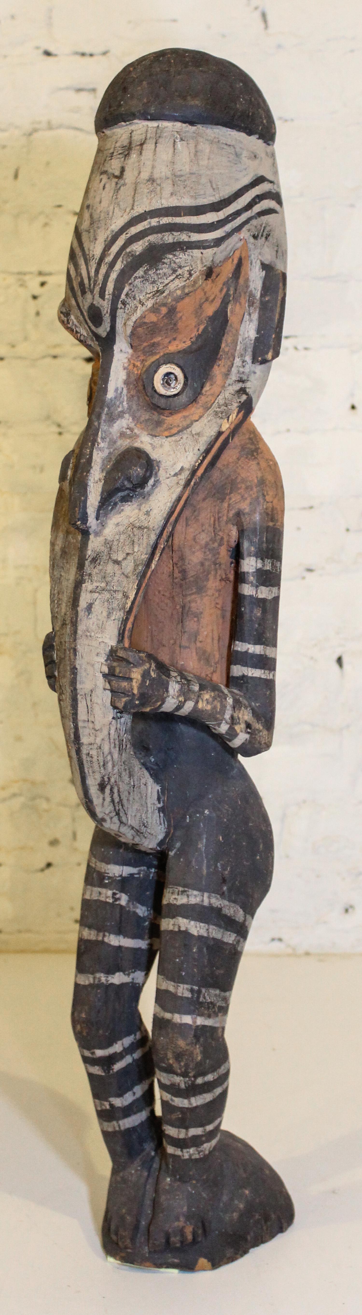 A Carved Wood Polychrome Figure Height 46 inches