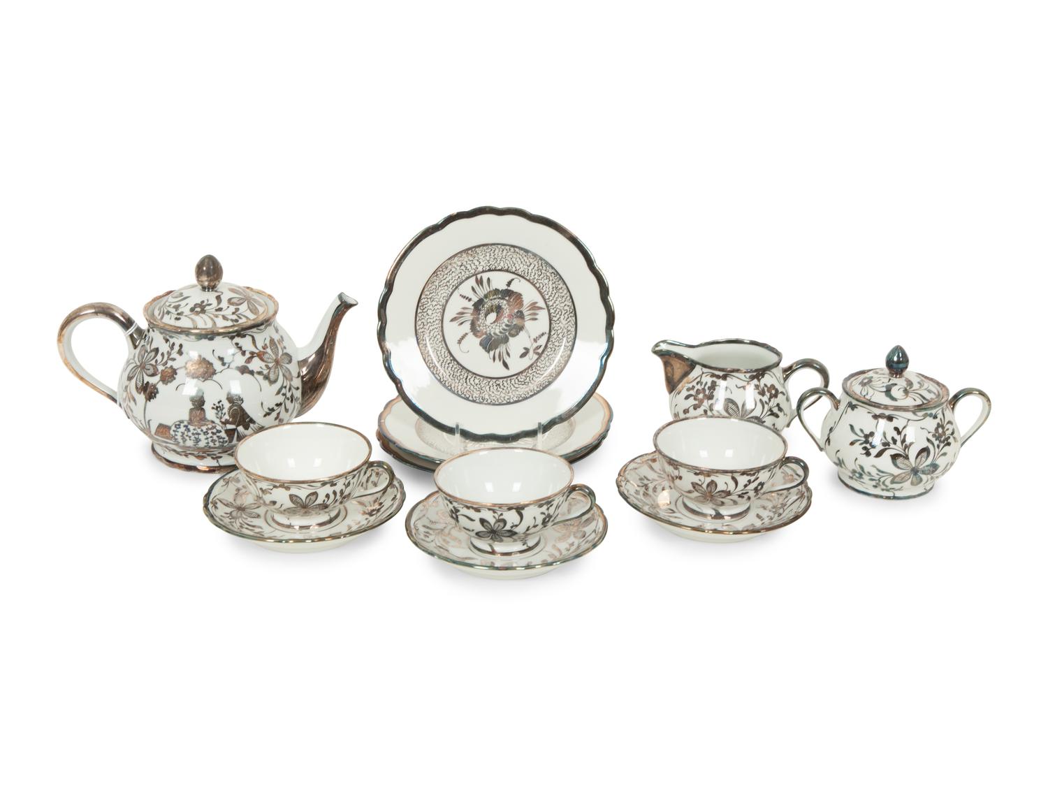 A Richard Ginori Silver-Overlay Porcelain Tea Service