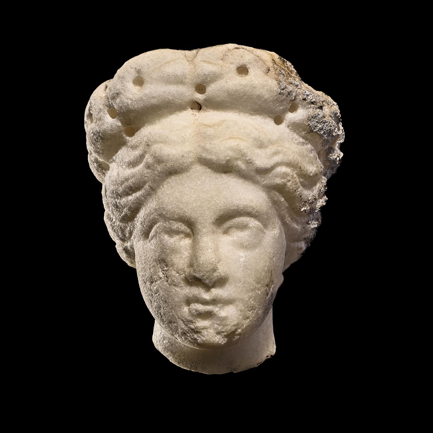 A Roman Marble Head of a Woman
