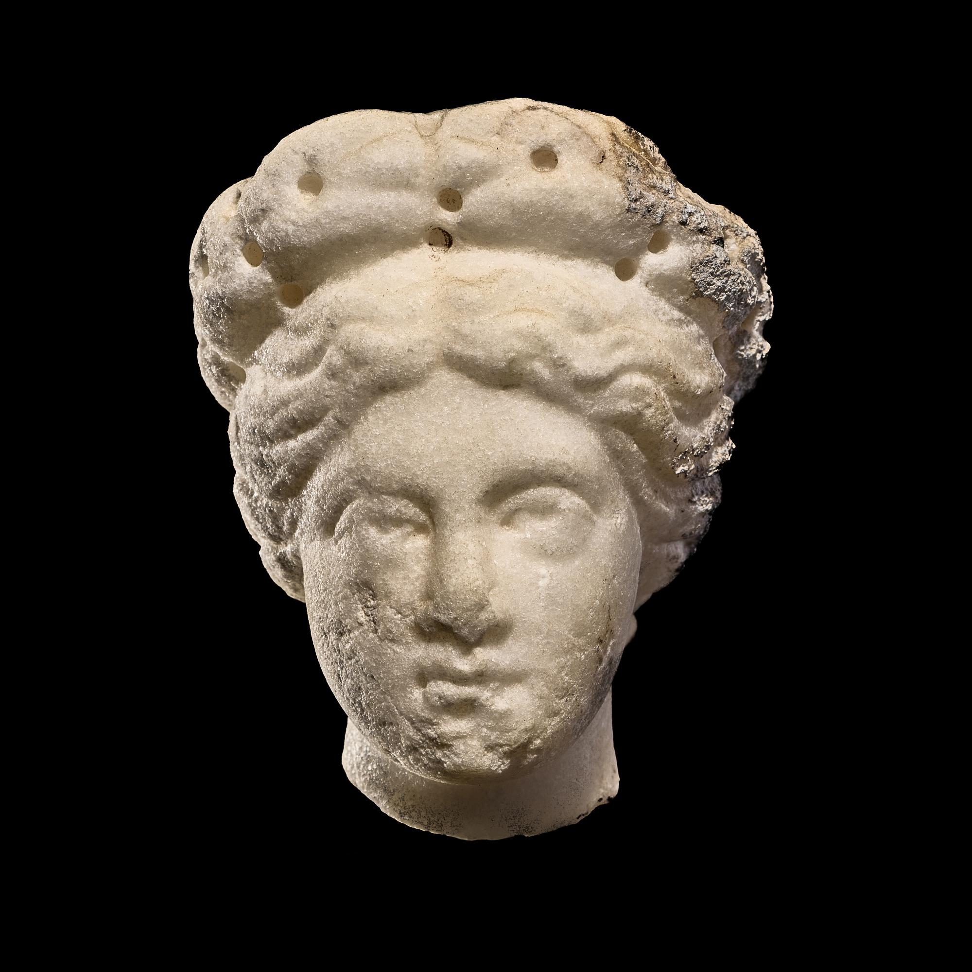 A Roman Marble Head of a Woman
