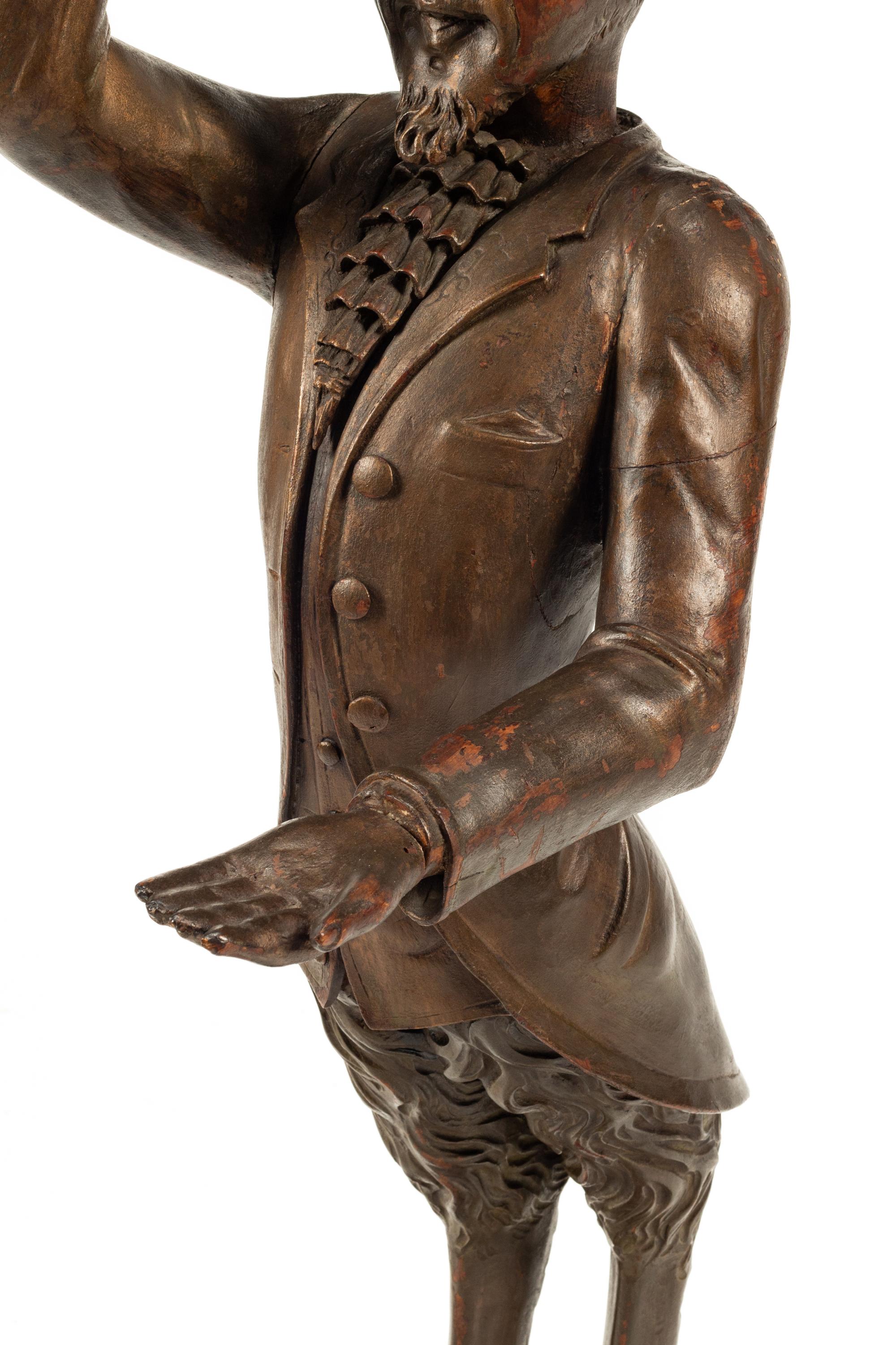 A Venetian Carved Walnut Figural Stand