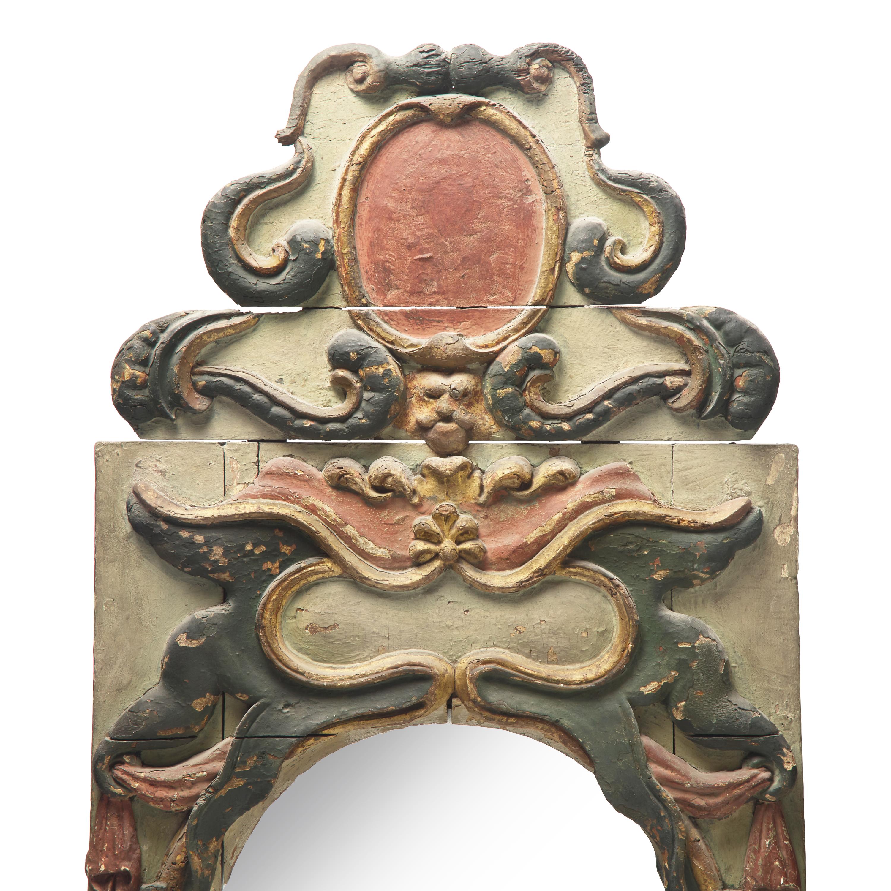 A Pair of Baroque Painted and Parcel-Gilt Looking Glasses