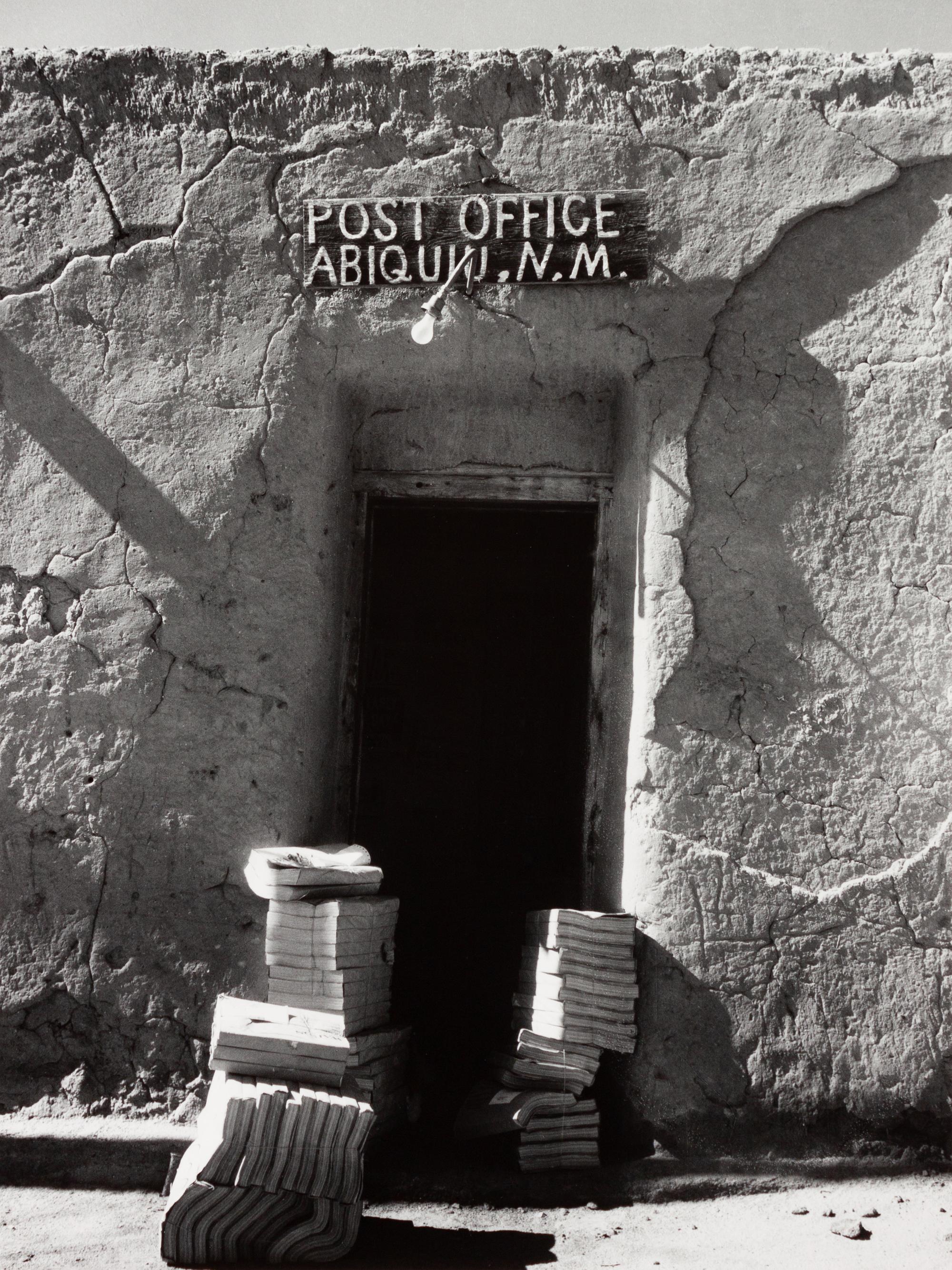 A group of four photographs ( Untitled (exterior wall) , 1960 (printed 1984); Georgia O'Keeffe in Twilight Canyon , 1964 (printed 1984); Untitled (Post Office, Abiquiu, NM), 1960 (printed 1984); O'Keeffe Sketching in Glen Canyon , 1961 (printed 1985)