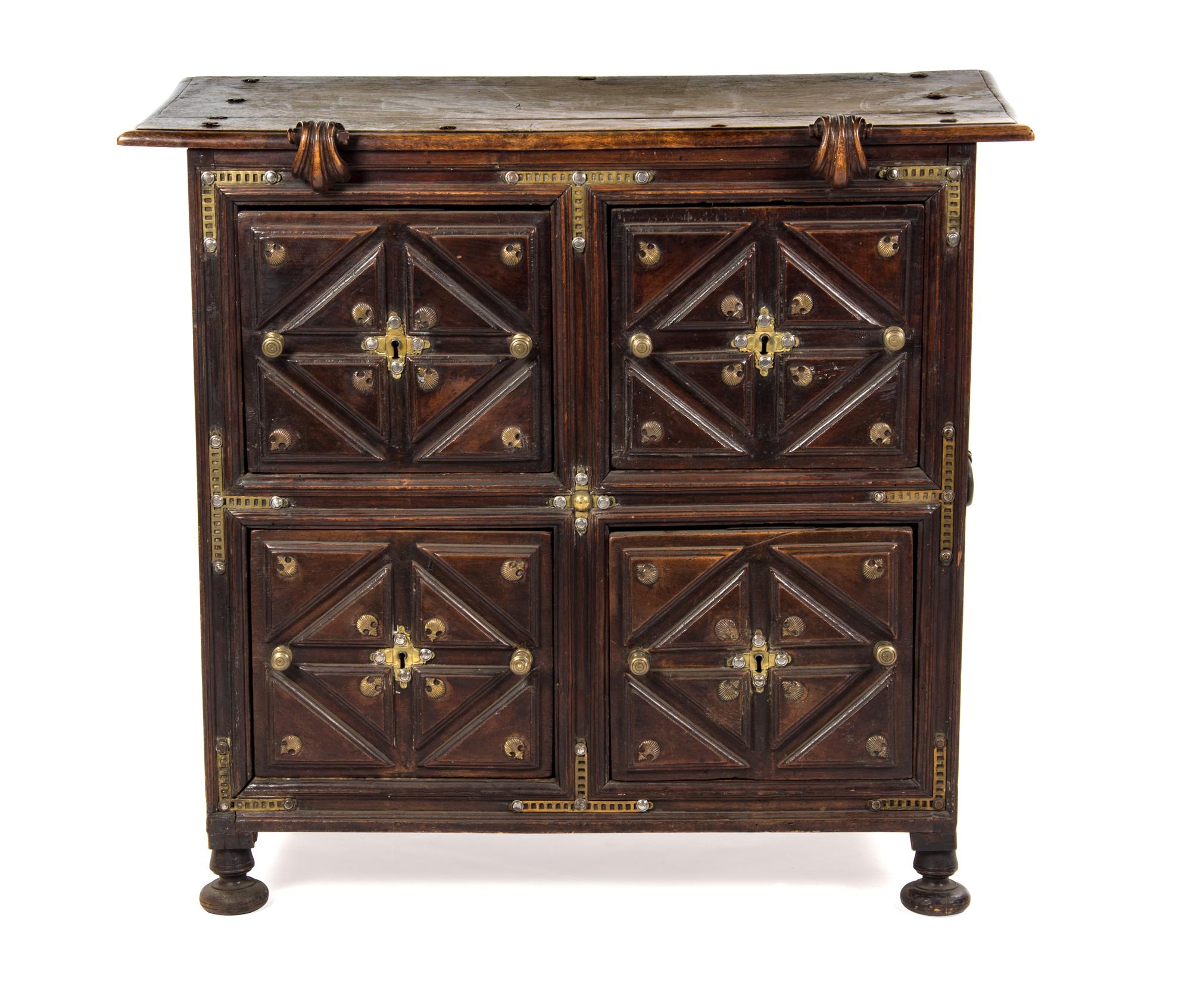 A Spanish Brass Mounted Chest, Height 39 3/8 x width 43 1/3 x depth 21 1/2 inches.