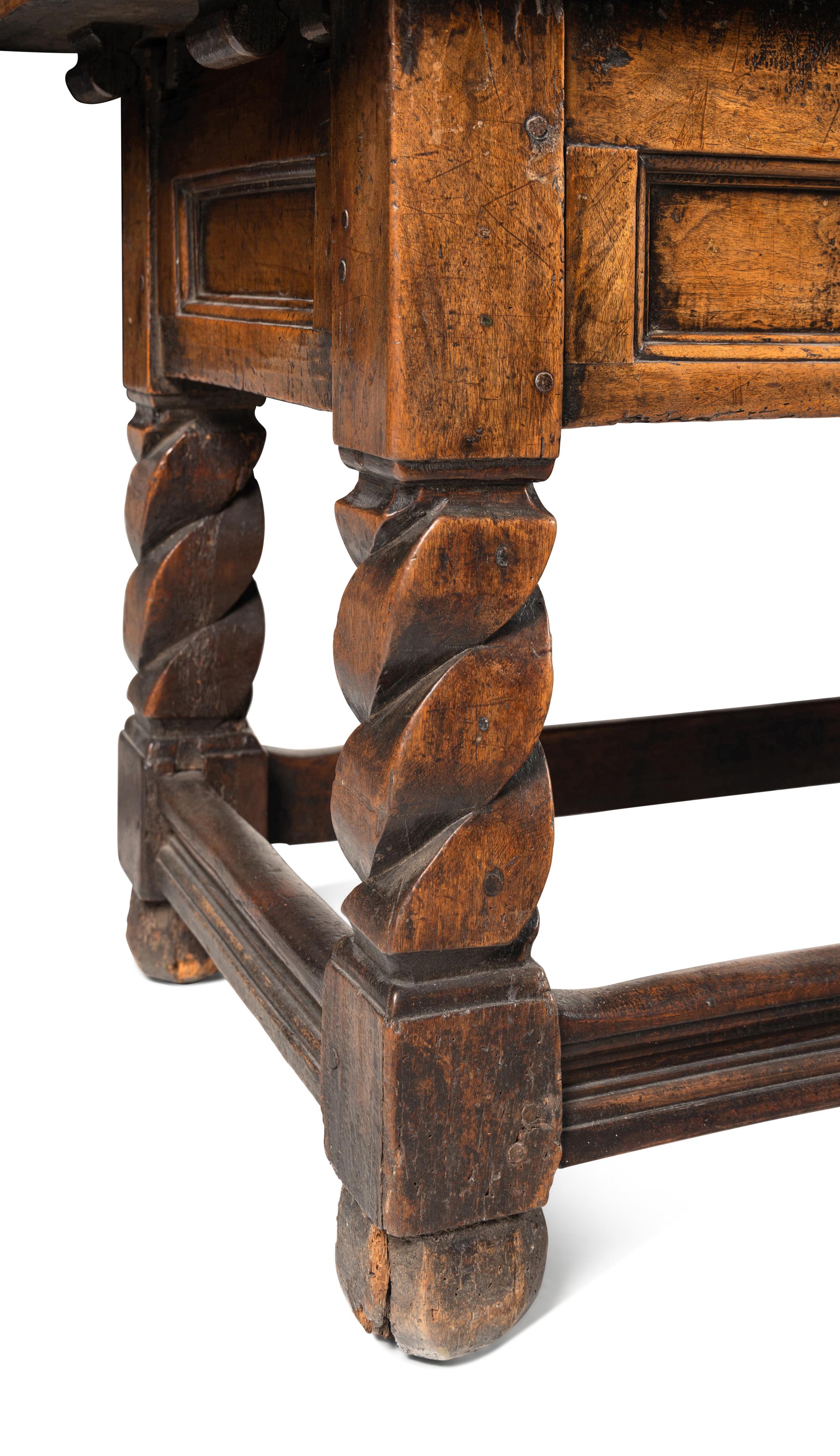 A Swiss Baroque Walnut and Hollywood Marquetry Draw-Leaf Table
