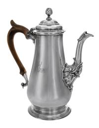 A George III Silver Coffee Pot, Probably Thomas Watson, Newcastle, Circa 1800, having a cone finial surmounting a baluster form body wi