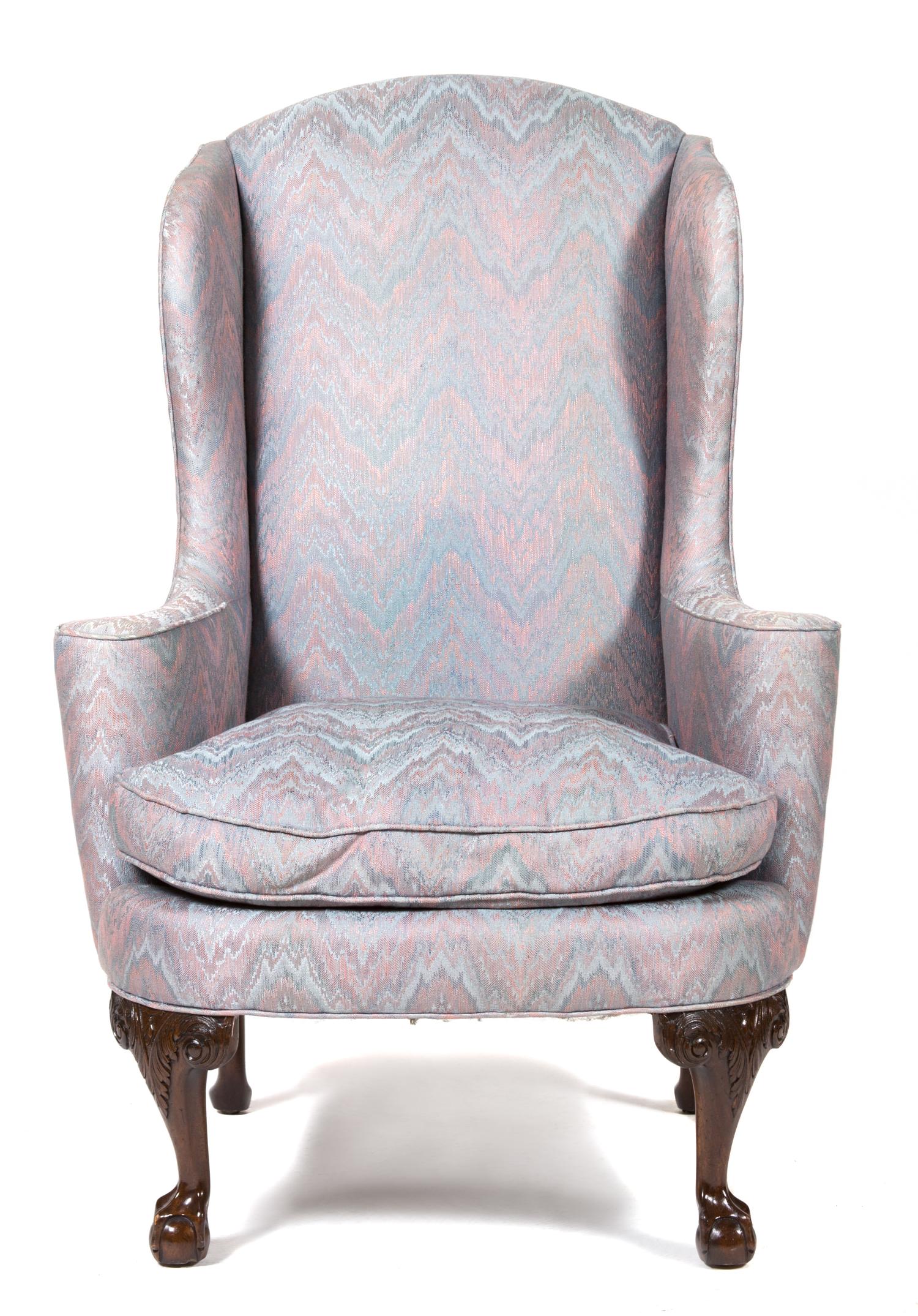 A Chippendale Style Mahogany Upholstered Wing Chair Height 46 inches. — 20TH CENTURY