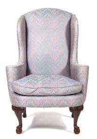 A Chippendale Style Mahogany Upholstered Wing Chair Height 46 inches. — 20TH CENTURY