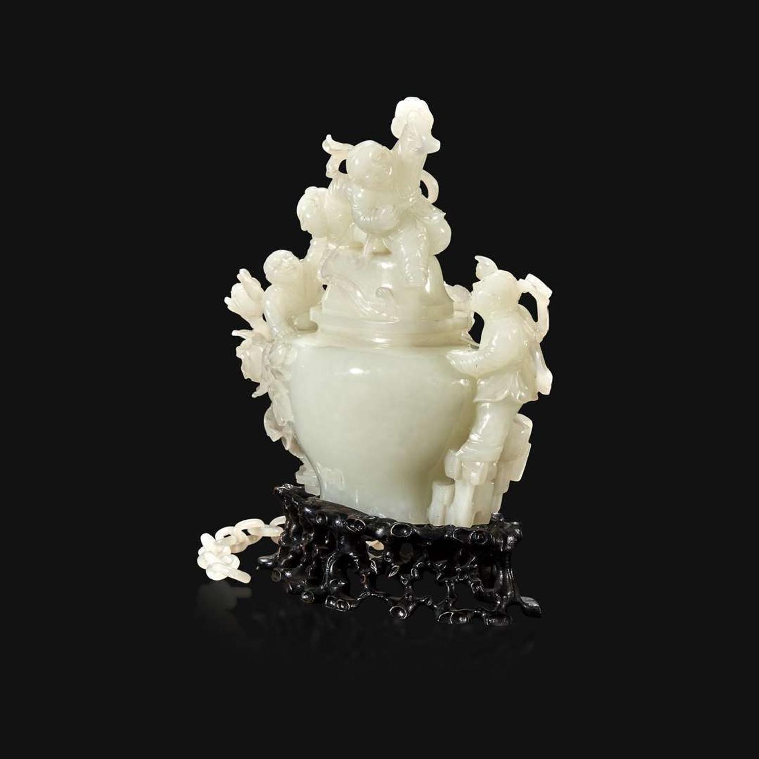 A Chinese carved white jade "Boys" vase and cover Qing Dynasty, 18th/early 19th Century