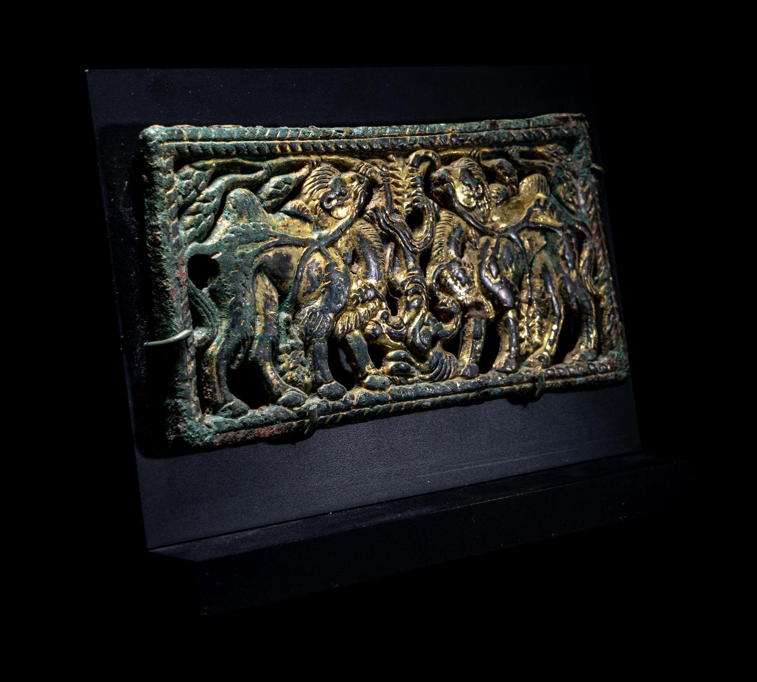 An Ordos Gilt-Bronze Plaque with Mythological Creatures