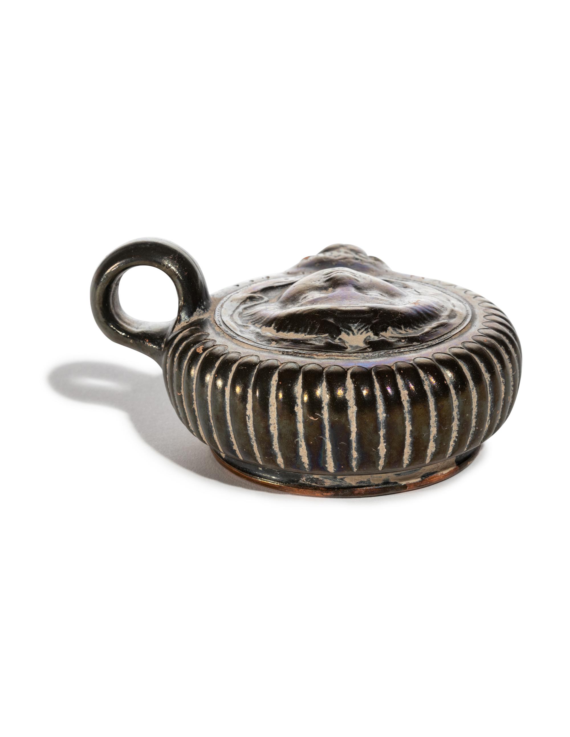 A Greek Black-Glazed Guttus