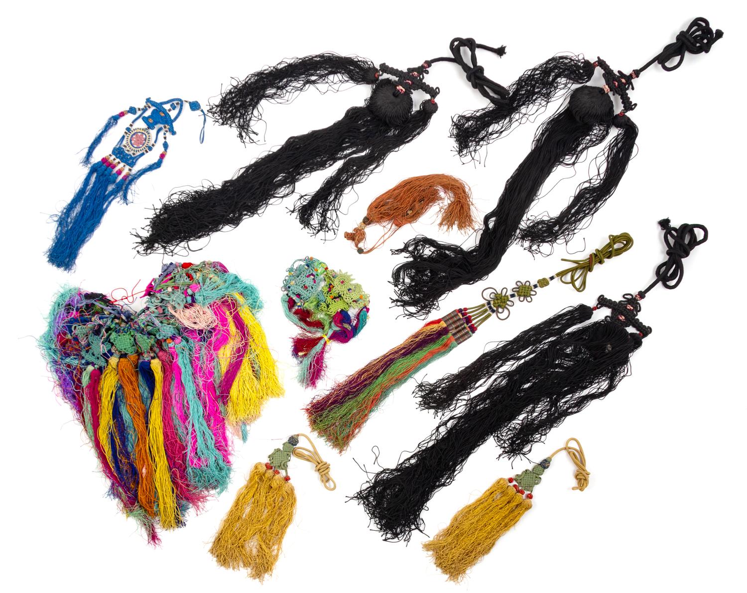 A Large Collection of Chinese Embroidered Endless Knots and Tassels Length of largest 69 inches.