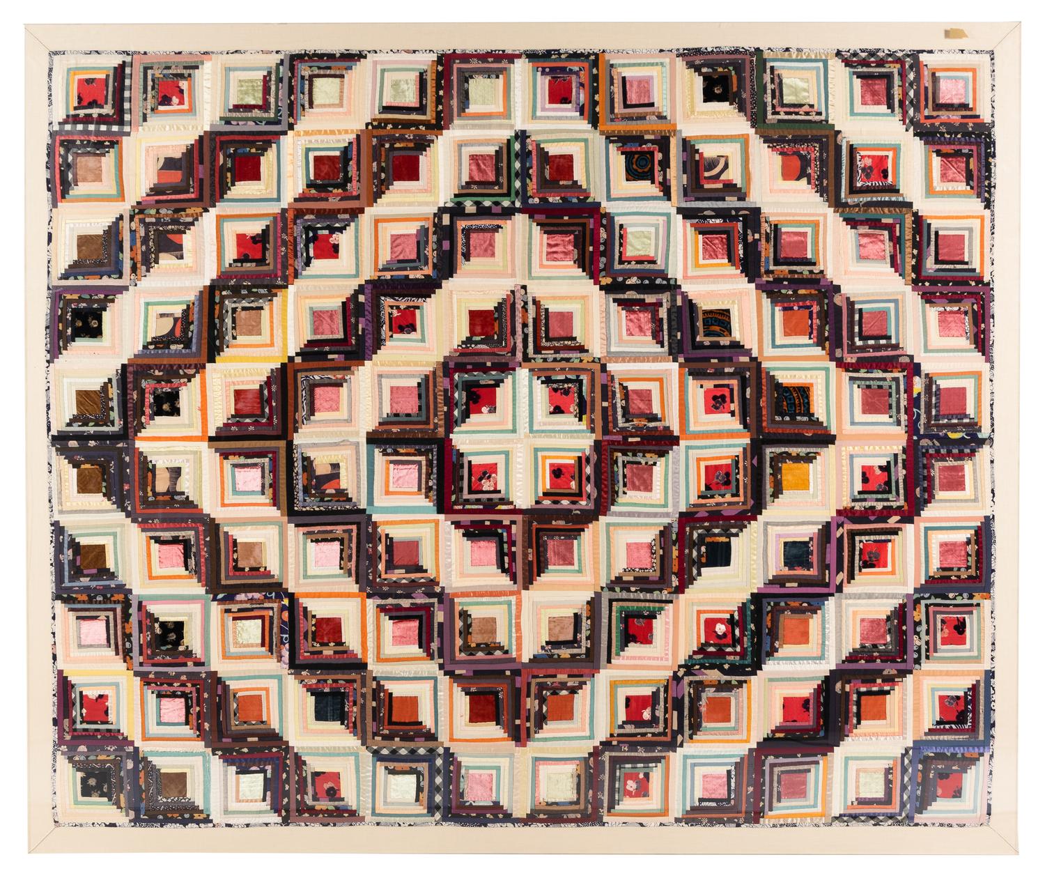 A Log Cabin Pattern Pieced Silk and Satin Quilt