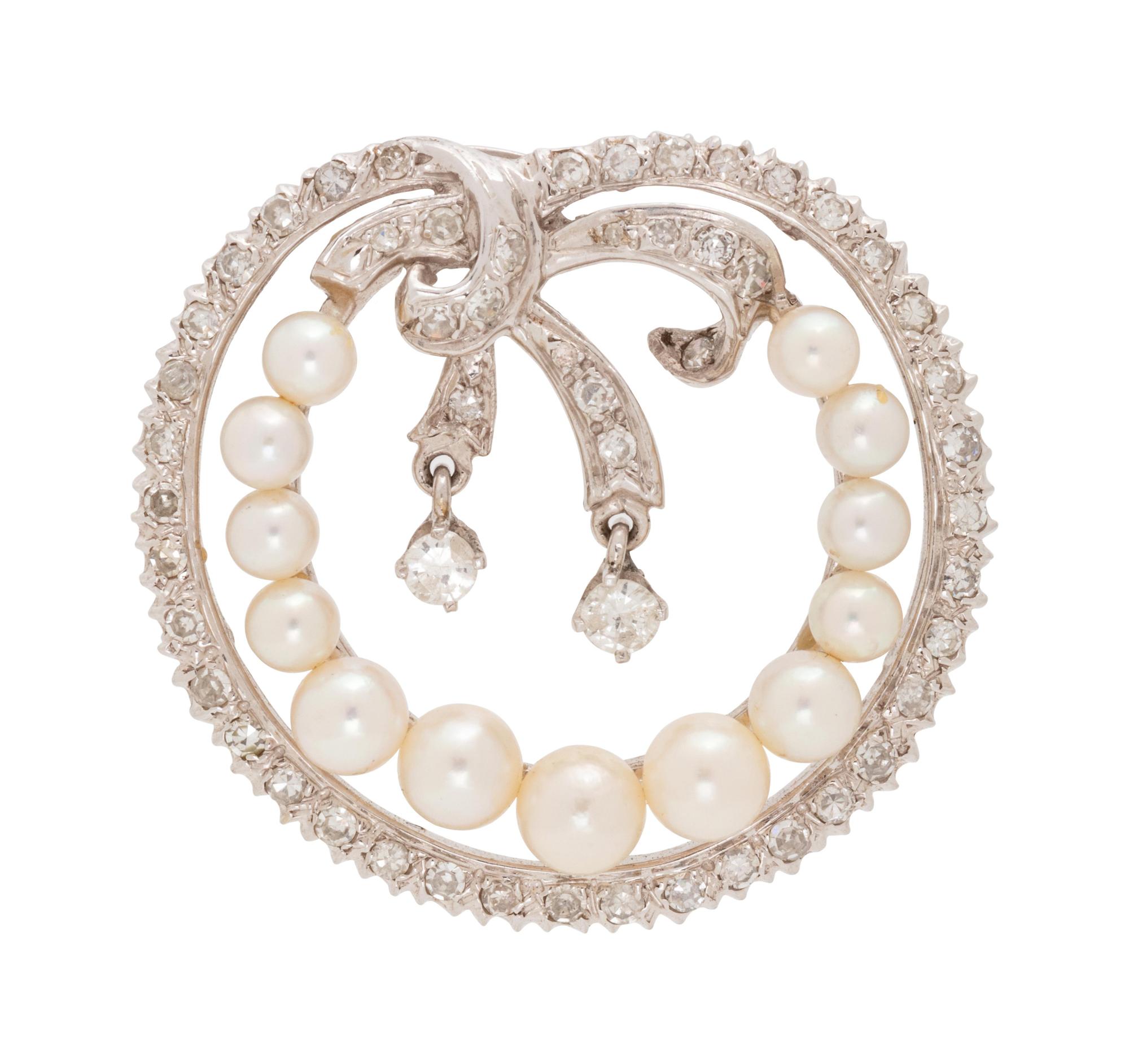 A White Gold, Diamond and Cultured Pearl Pendant/Brooch,