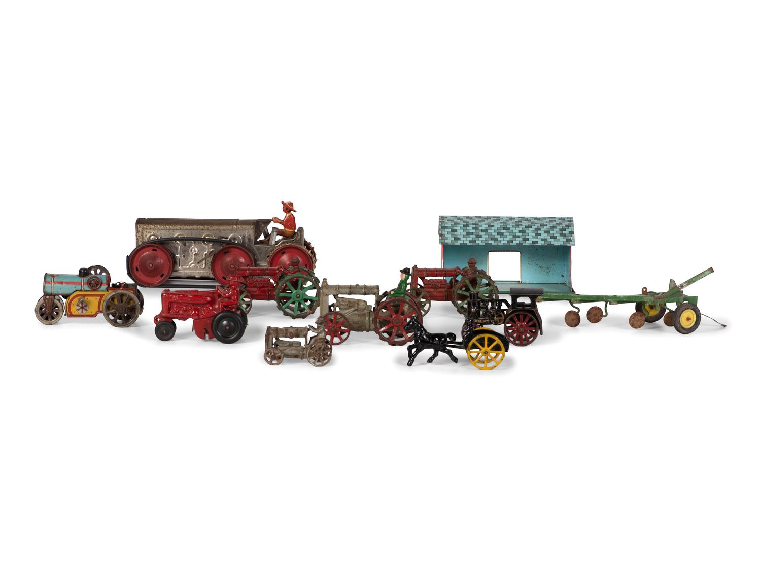 Eleven Metal Tractors and Other Farm Toys