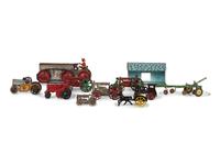 Eleven Metal Tractors and Other Farm Toys