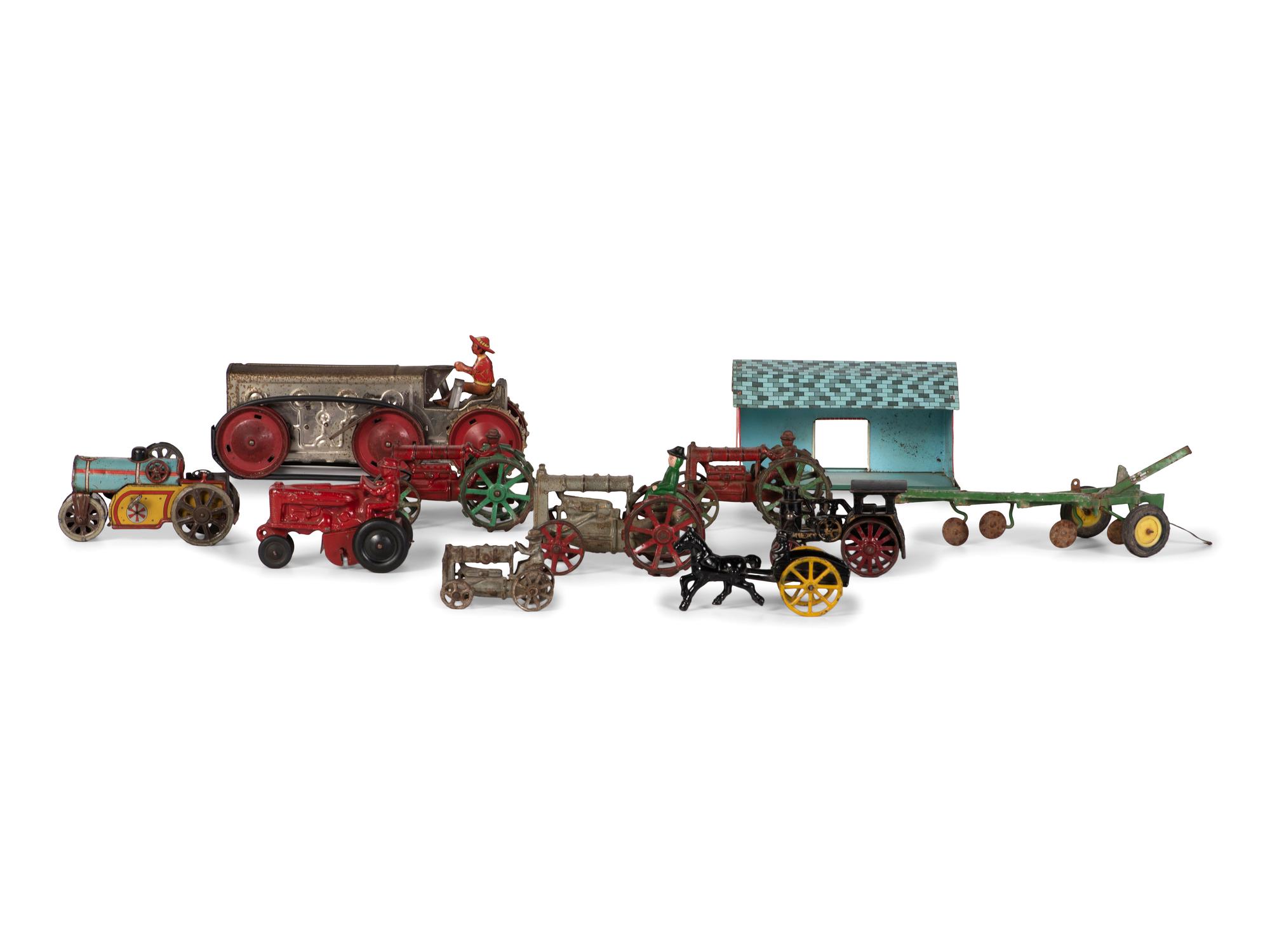 Eleven Metal Tractors and Other Farm Toys