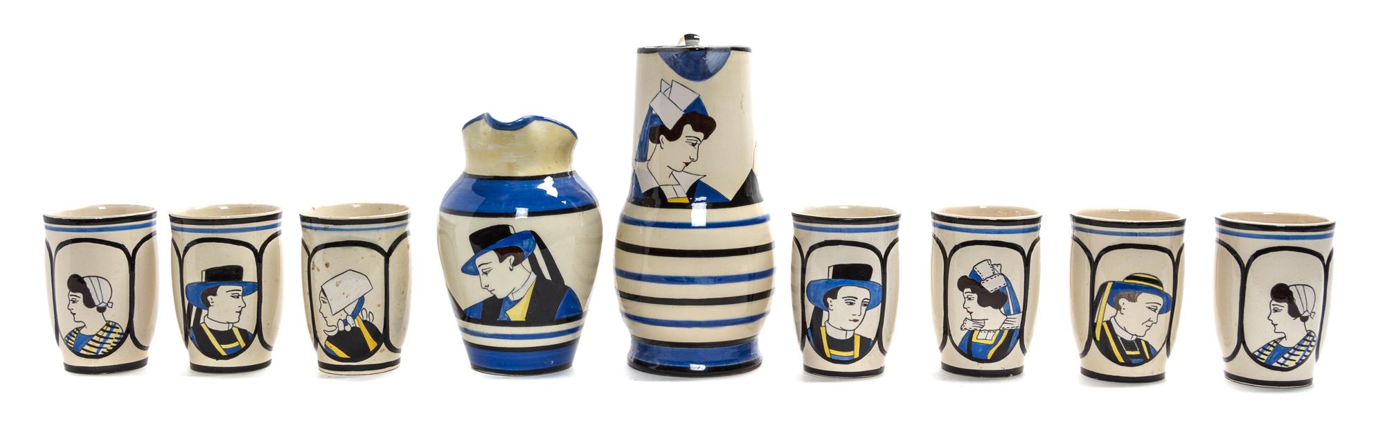 A Collection of Quimper Pottery Articles Diameter of last 15 1/4 inches.