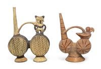 Two Pre-Columbian Terracotta Stirrup Vessels, Chancay, Height of taller 9 7/8 inches.