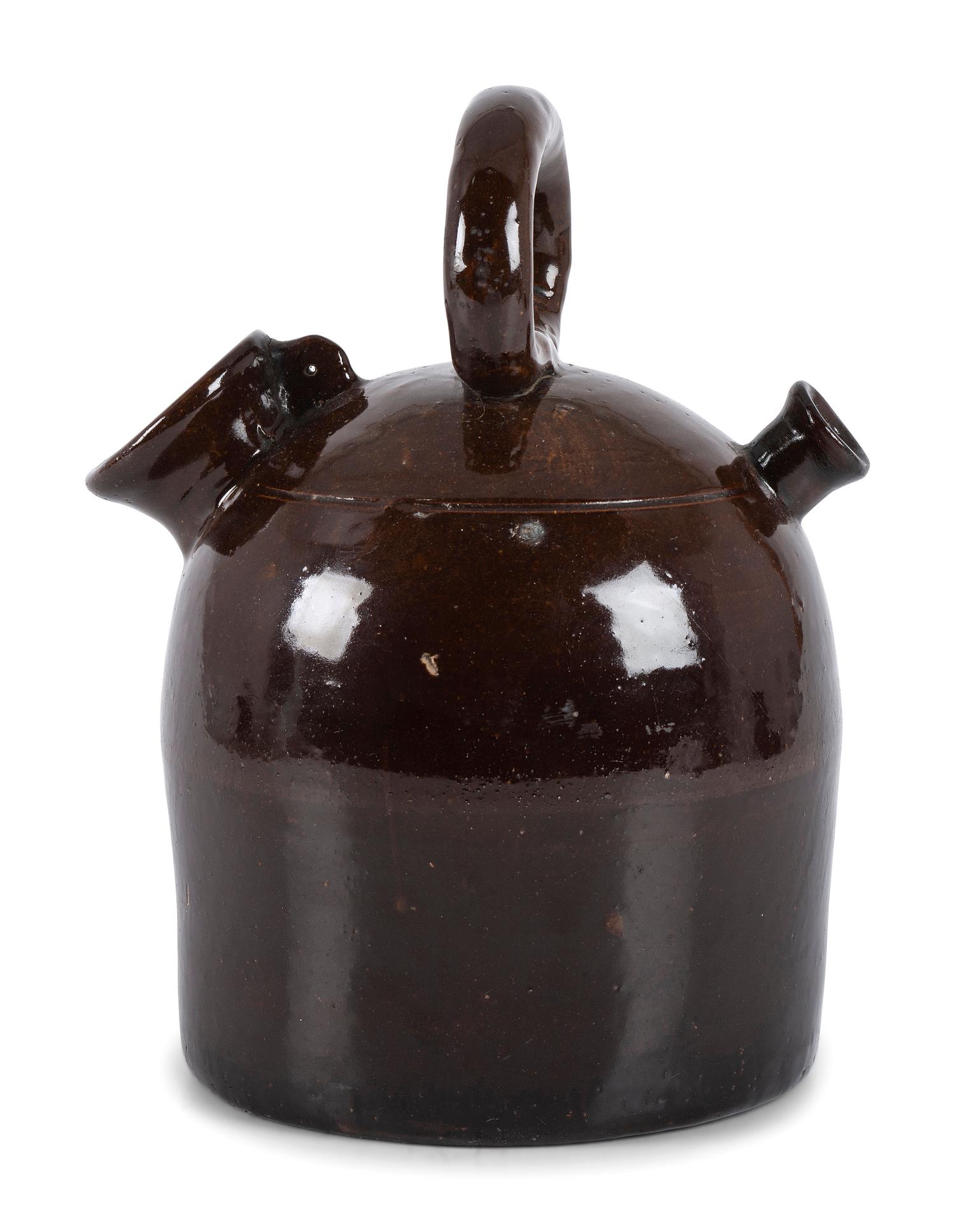An Ohio Stoneware Albany Slip Harvest Jug