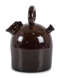 An Ohio Stoneware Albany Slip Harvest Jug