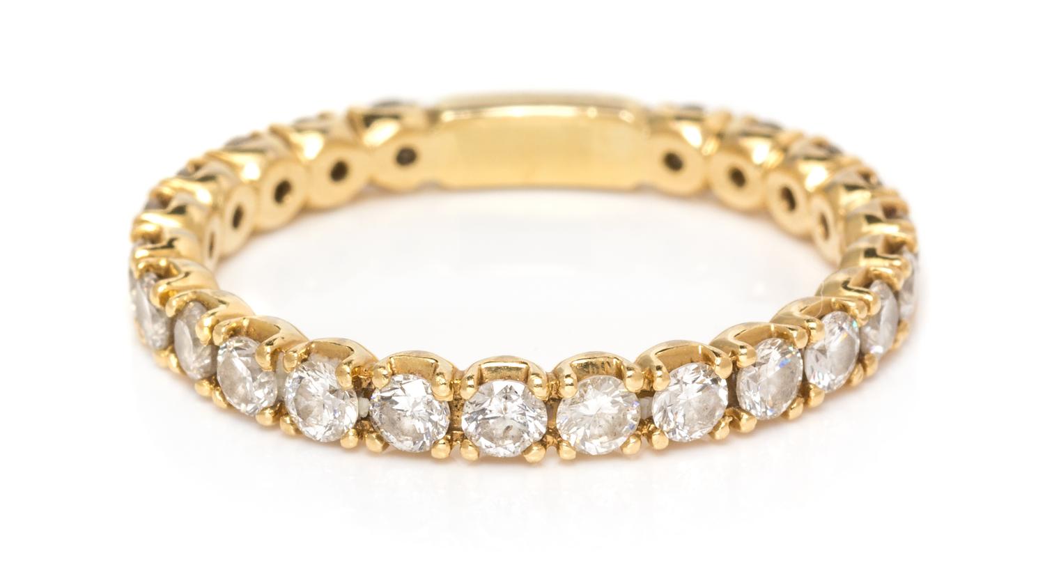 A Yellow Gold and Diamond Band,