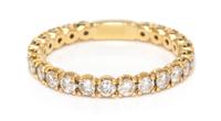 A Yellow Gold and Diamond Band,