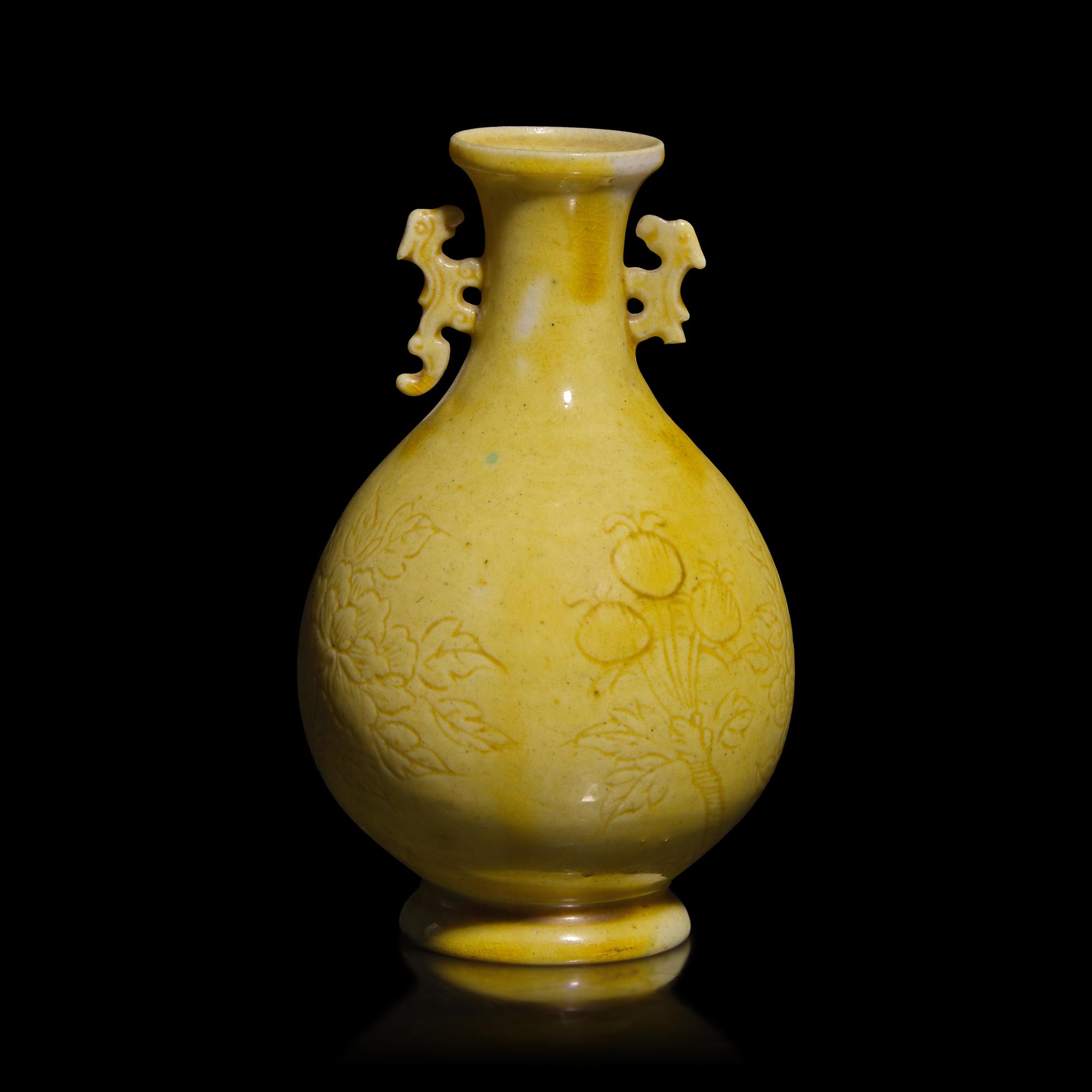 A Chinese Incised Yellow Glazed Small Vase, Qing Dynasty — 清 黃釉暗刻花鳥紋雙耳瓶