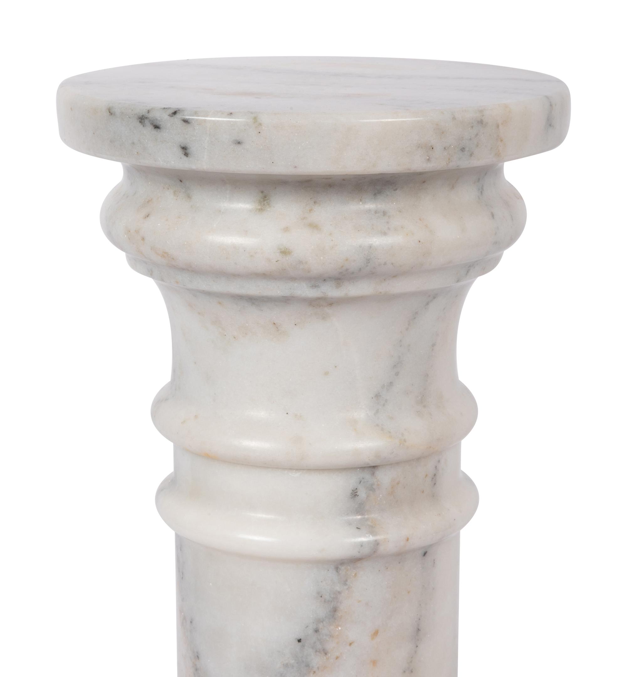 A Pair of Continental Carved Marble Pedestals