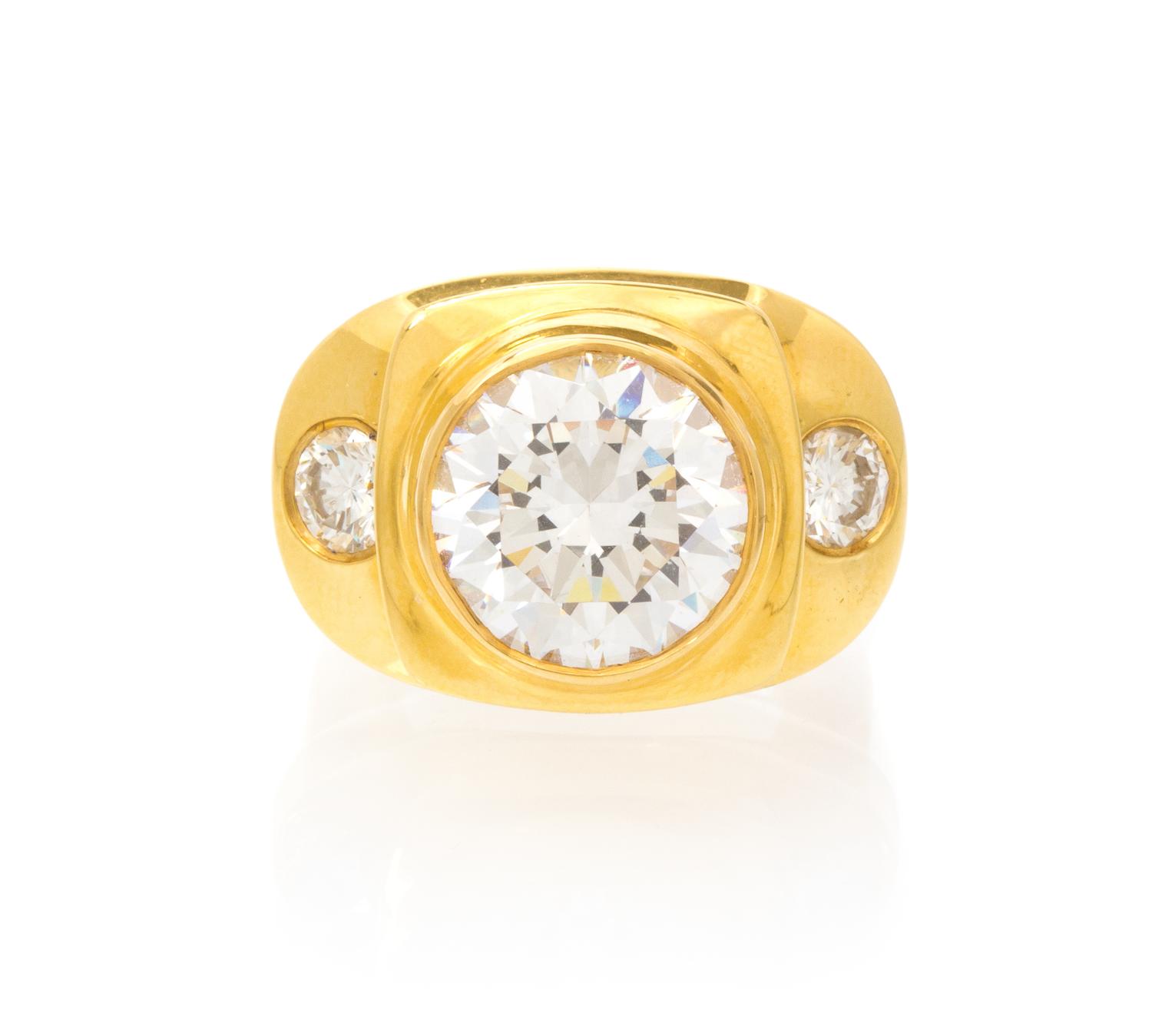 An 18 Karat Yellow Gold, Cubic Zirconia and Diamond Ring, 17.55 dwts.