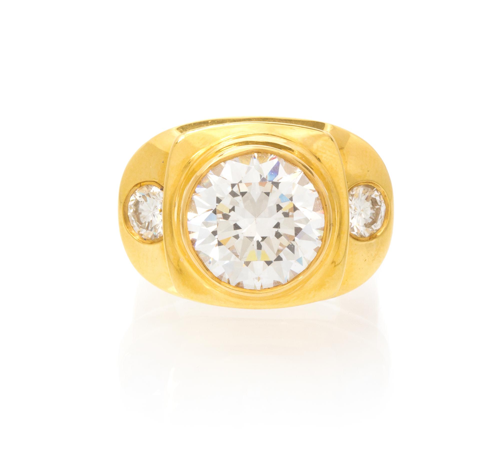 An 18 Karat Yellow Gold, Cubic Zirconia and Diamond Ring, 17.55 dwts.