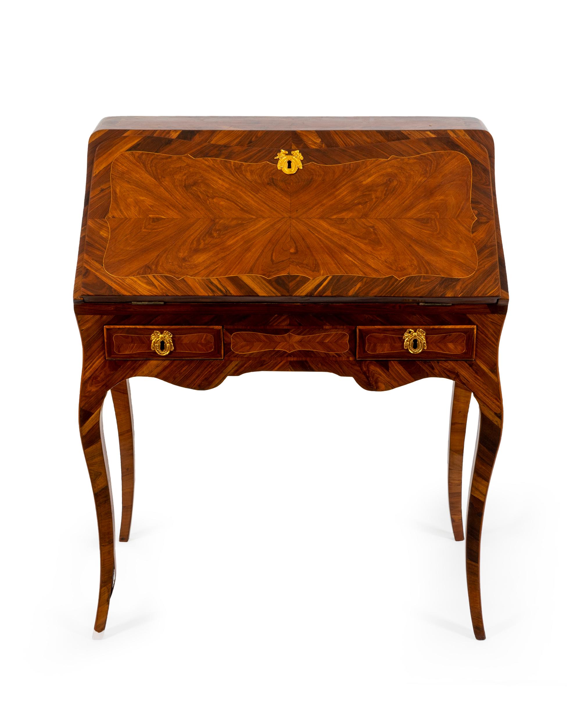 A Louis XV Gilt Bronze Mounted Tulipwood, Amaranth and Rosewood Bureau en Pente — Jean Ulrich Erstet, Paris, Circa 1745