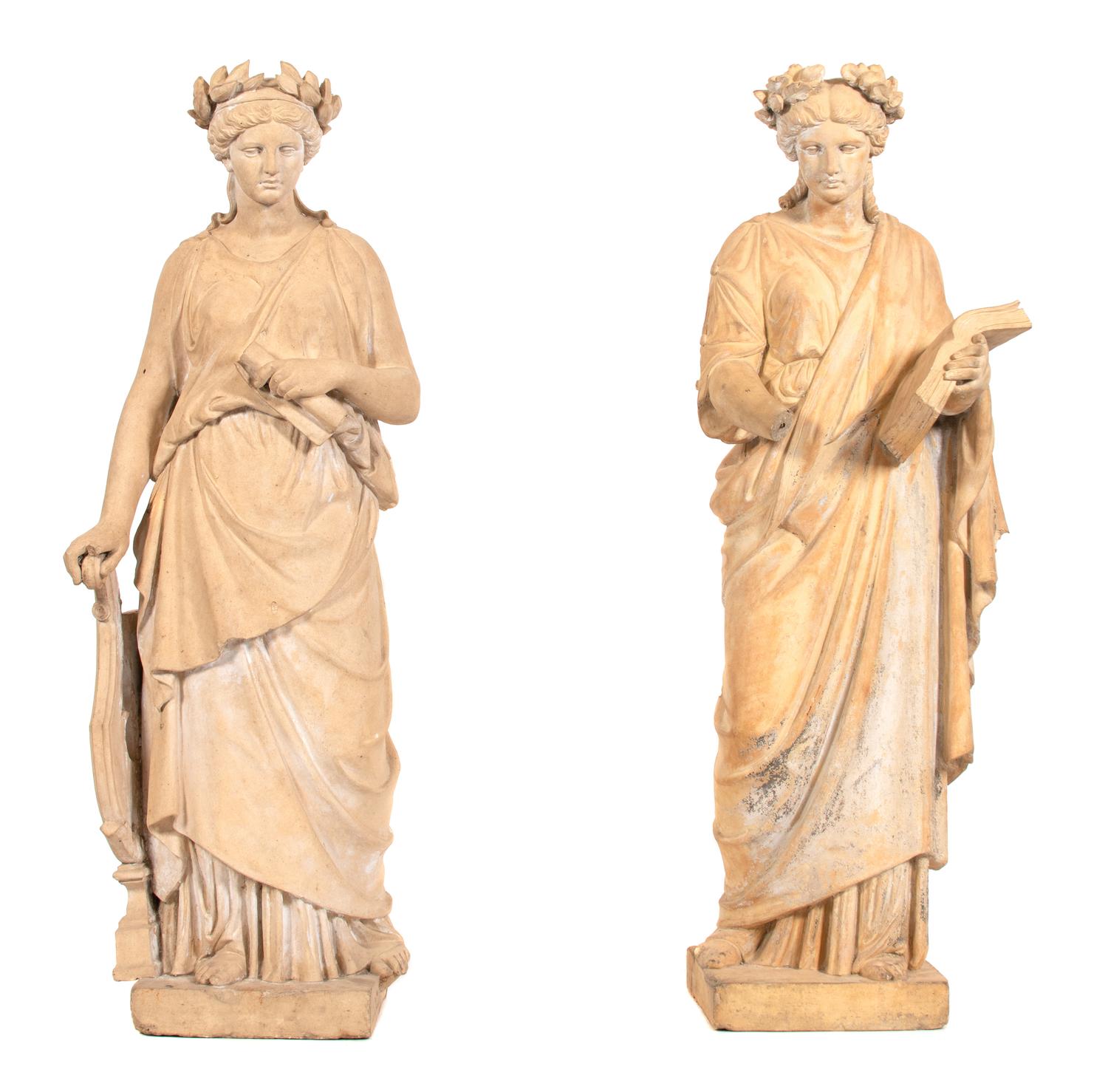 A Pair of Classical Style Statues Depicting Grecian Muses — AFTER THE ANTIQUE/ 20TH CENTURY