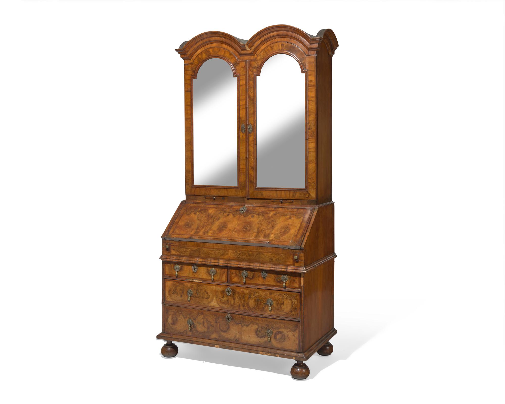 A William & Mary burl walnut-veneered double-domed secretary desk, circa 1700