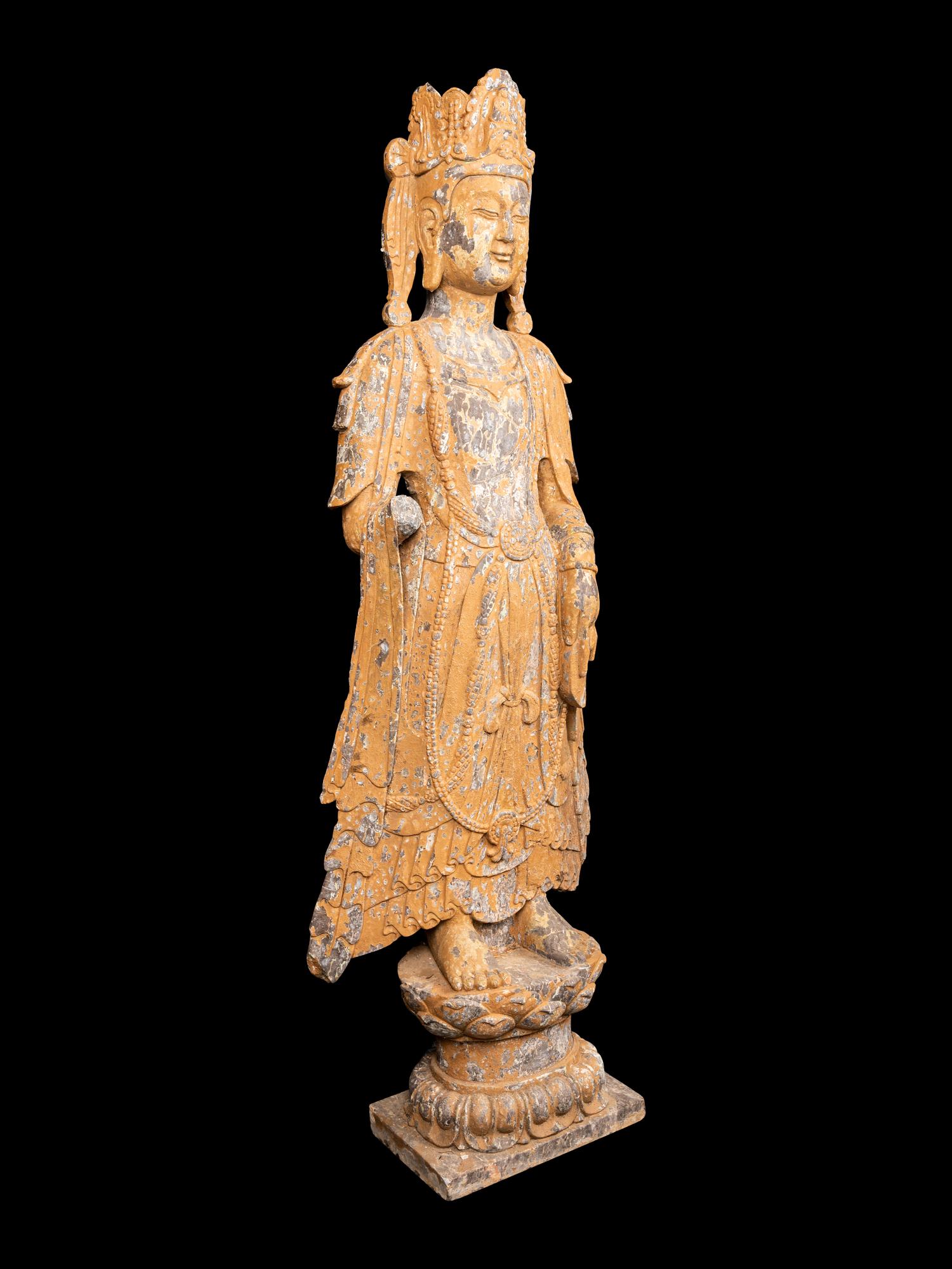 A Chinese Carved Stone Standing Guanyin Figure