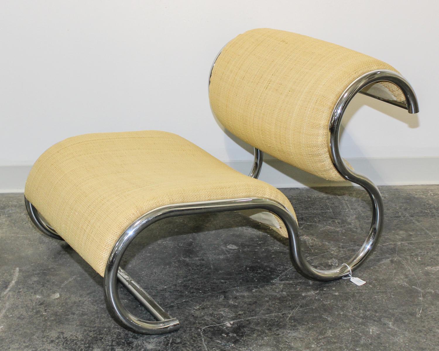 A Rattan and Chromed Metal Lounge Chair Height 23 1/2 x width 24 x depth 37 1/2 inches.