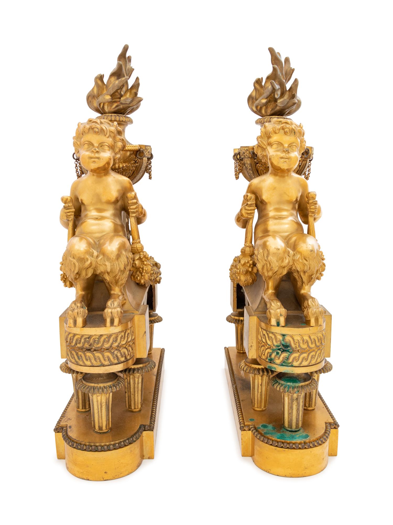 A Pair of Louis XVI Style Gilt Bronze Figural Chenets