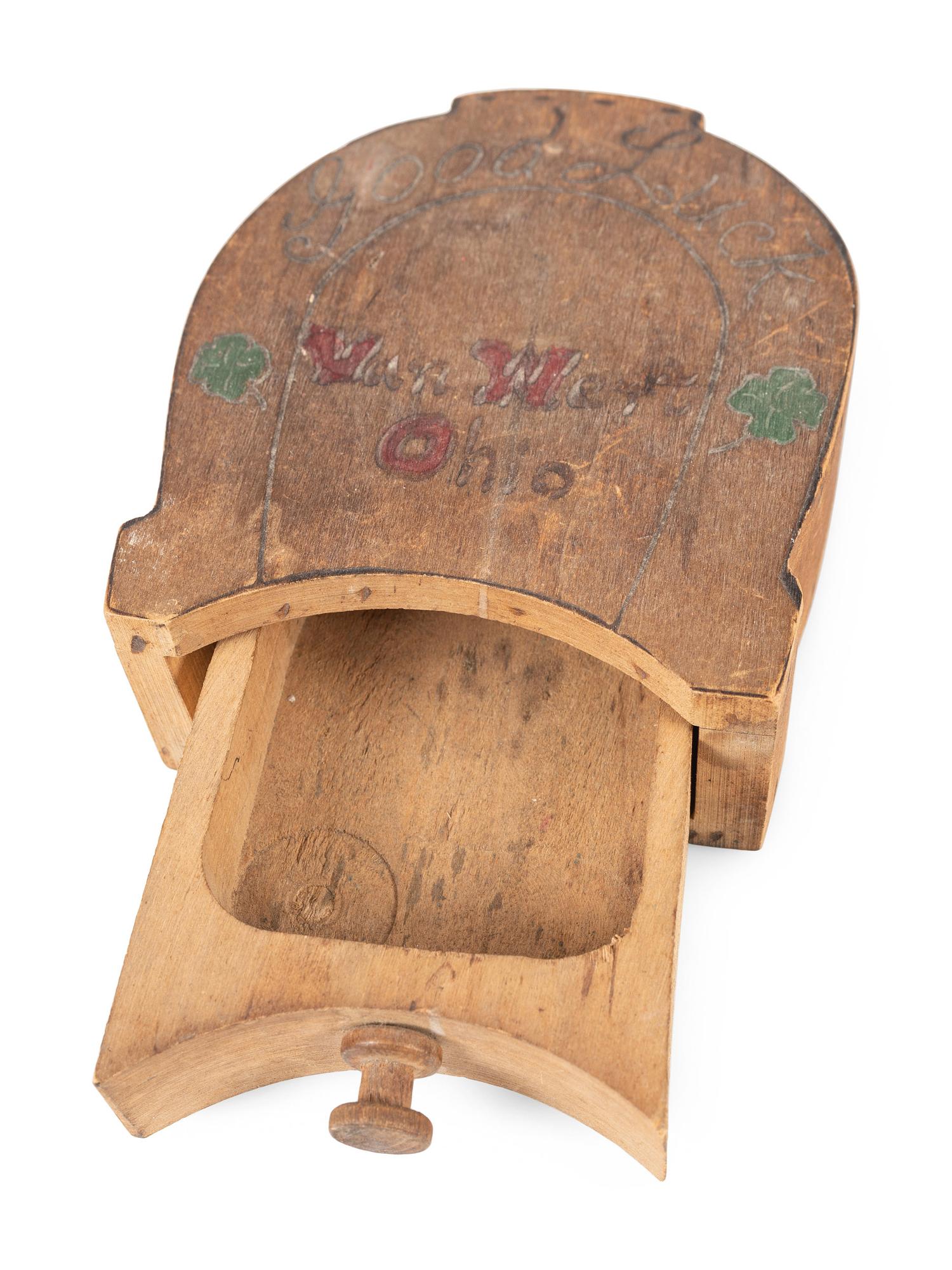 An Ohio Painted Folk Art Box in the Shape of a Horseshoe