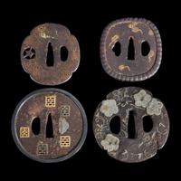 Group of eight assorted Japanese tsuba Meiji period and earlier