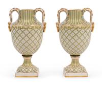 A Pair of Sèvres Style Porcelain Urns