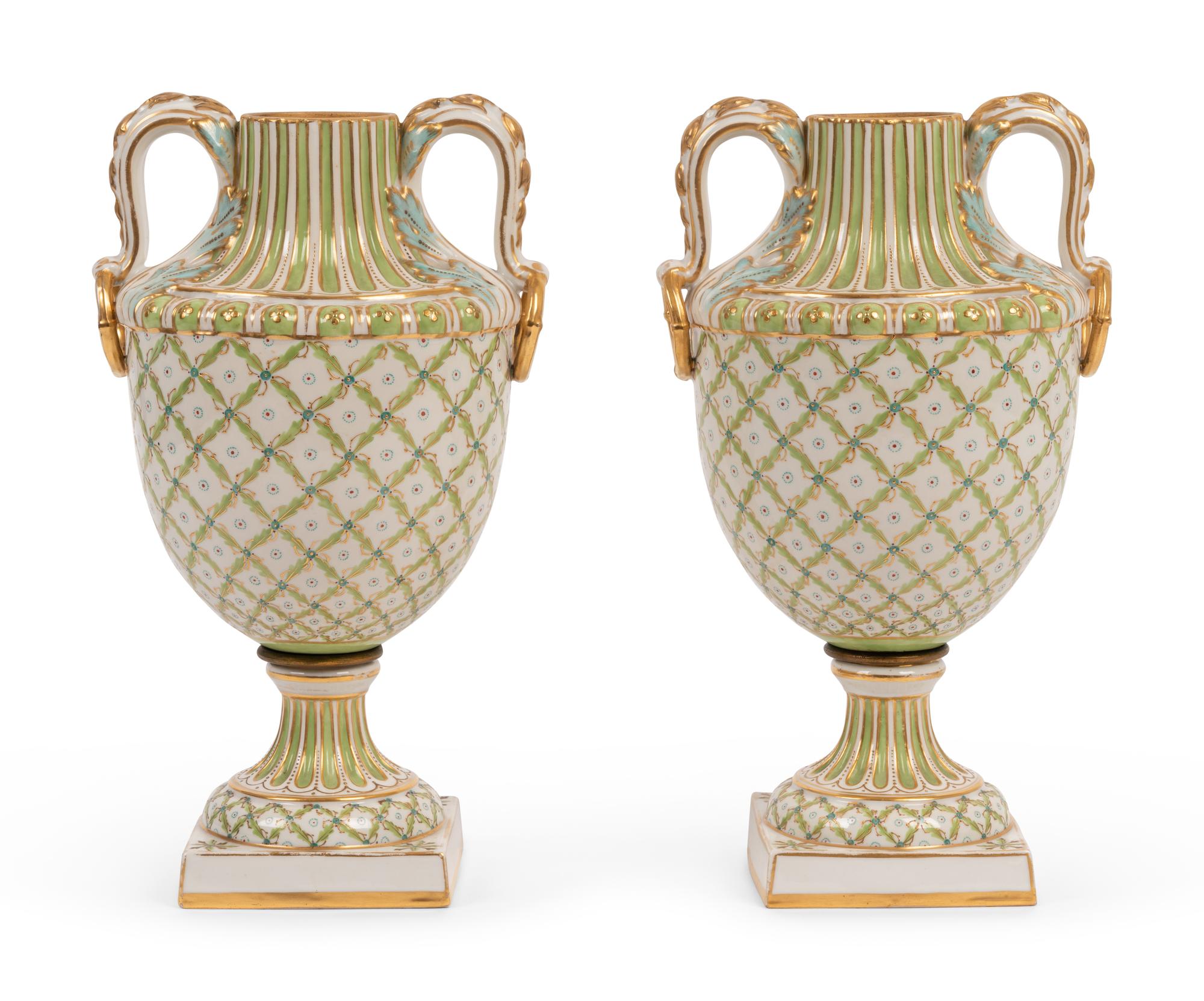 A Pair of Sèvres Style Porcelain Urns